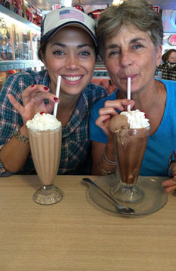 Megan Conway drinking a milkshake with her mom