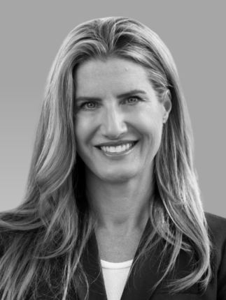 A headshot of a female smiling