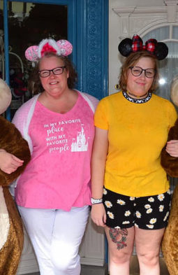 Charlotte Salo smiling alongside her daughter with Disney Mickey Mouse ears on