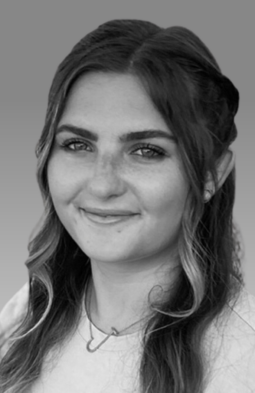 A headshot of a female smiling