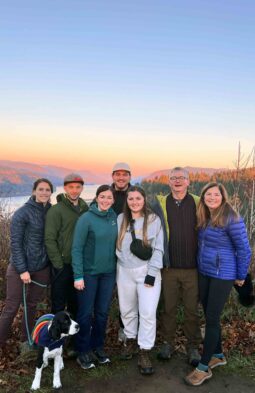 jen ling with her family in front of a sunset