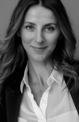 A headshot of a female smiling